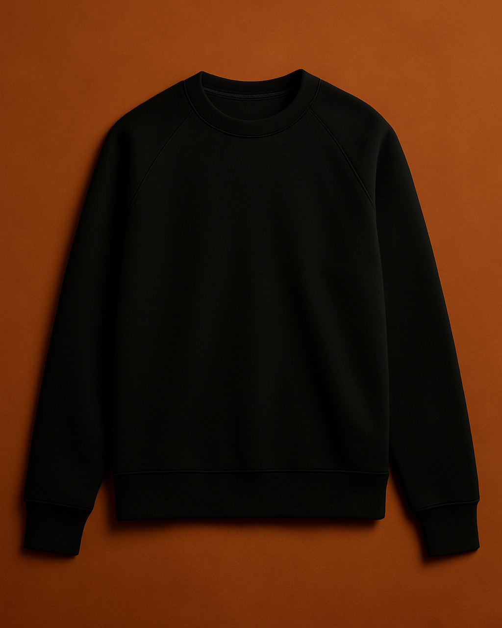 Black sweatshirt on a brown background