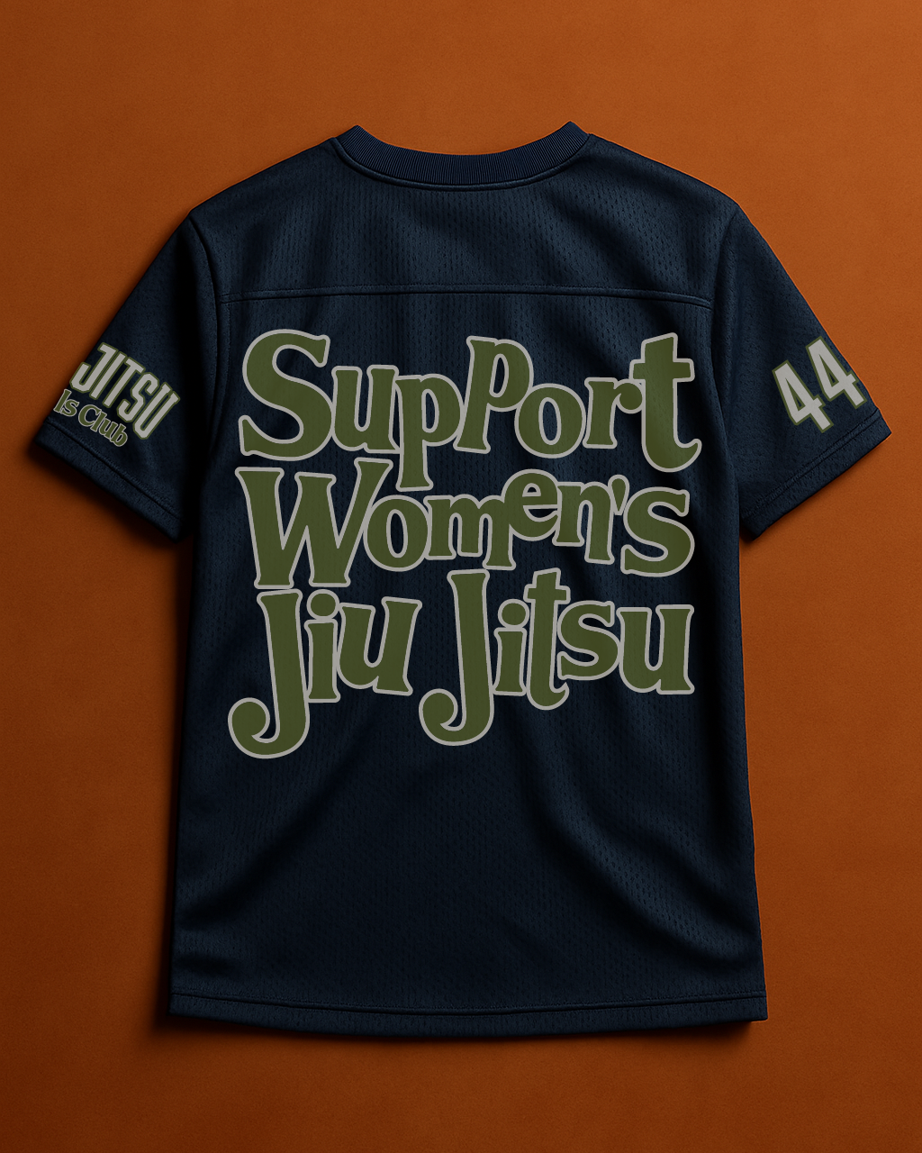 Black t-shirt with 'Support Women's Jiu Jitsu' text on an orange background