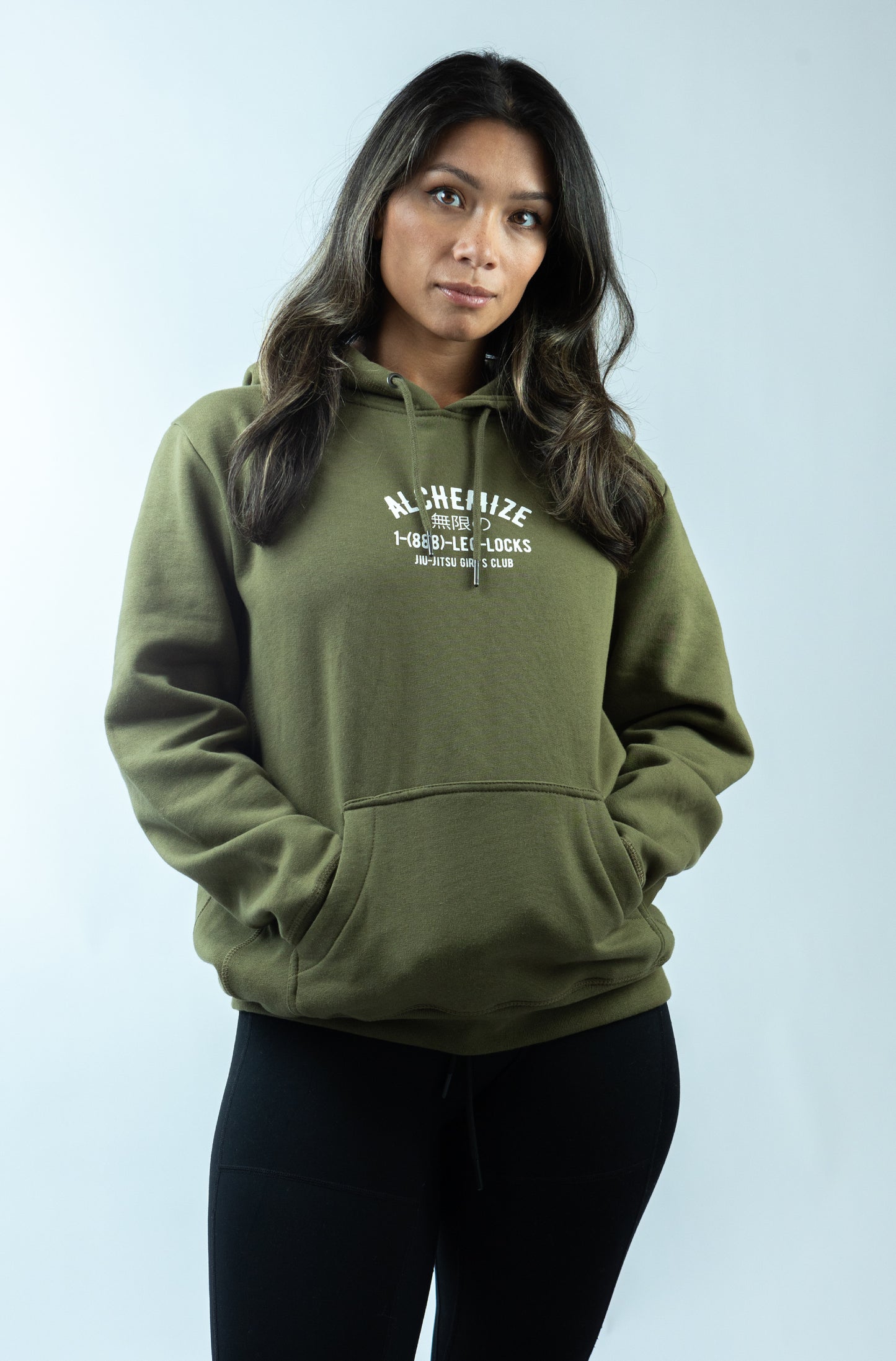 Model wearing 888 leg locks olive sweater