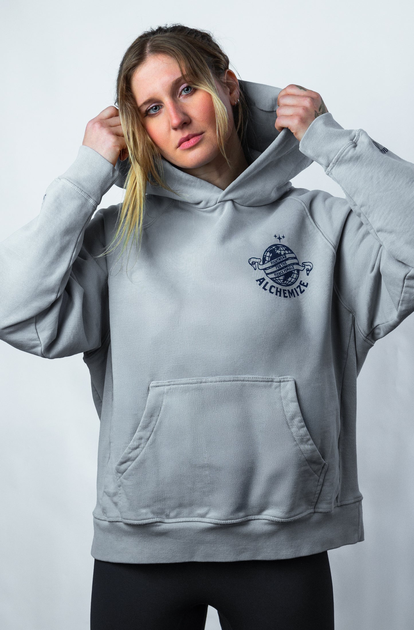 Front pocket hoodie for women. Small chest pocket design of celestial stars and globe 