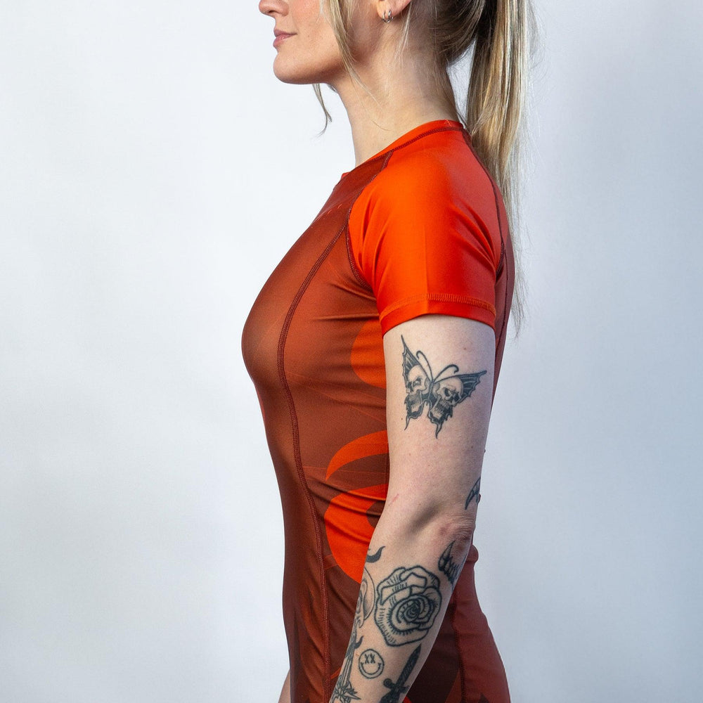 
                  
                    She Rises Short Sleeve Phoenix Rash Guard - Burnt Orange - Alchemize Fightwear
                  
                